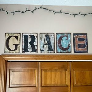 Rectangular decorative letters (G, R, A, C, E)
